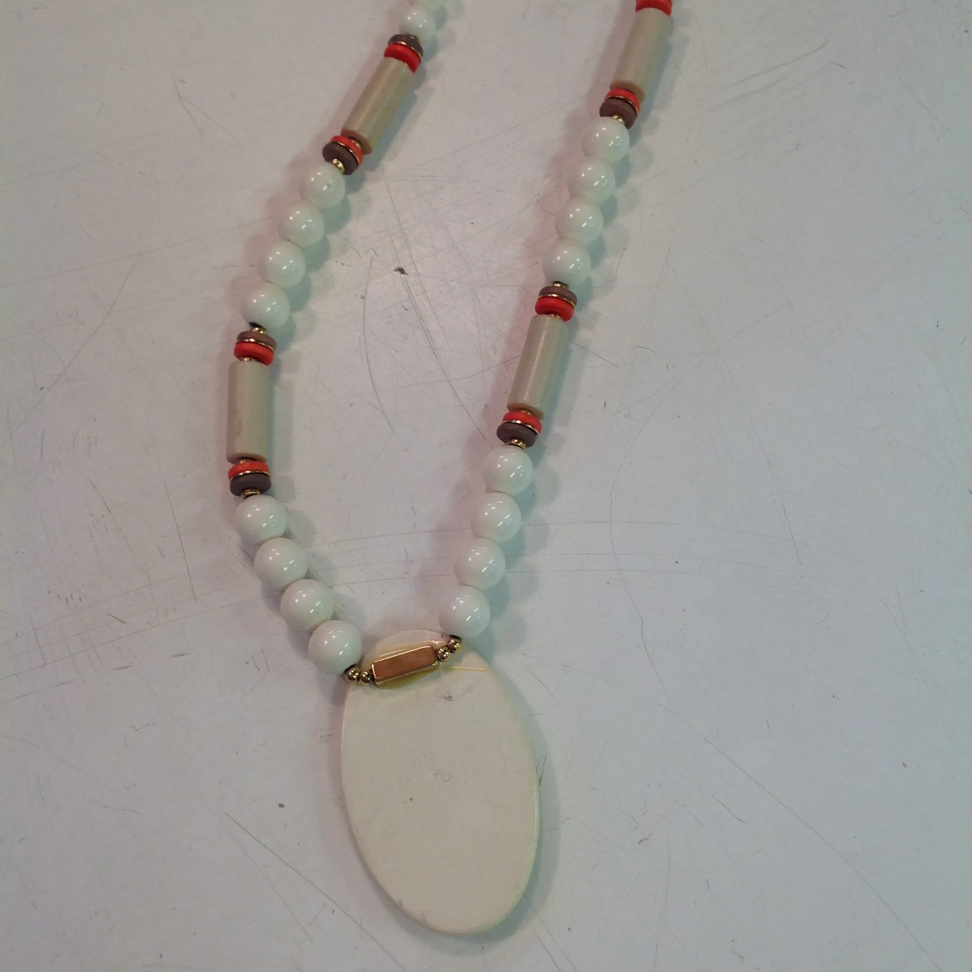 Vintage White Plastic Beaded Necklace with Enamel Autumn Foliage Pendant